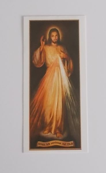 Abbildung von Jesus Christus in einem himmlischen Licht mit erhobener Hand.
